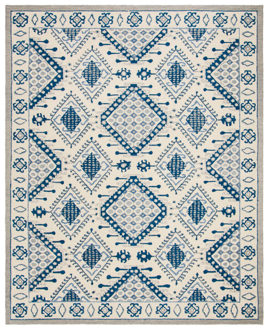 Safavieh Micro-Loop Pasha 8 x 10 (ft) Tufted Wool Ivory/Blue Rectangular Indoor Floral/Botanical Southwestern Area rug