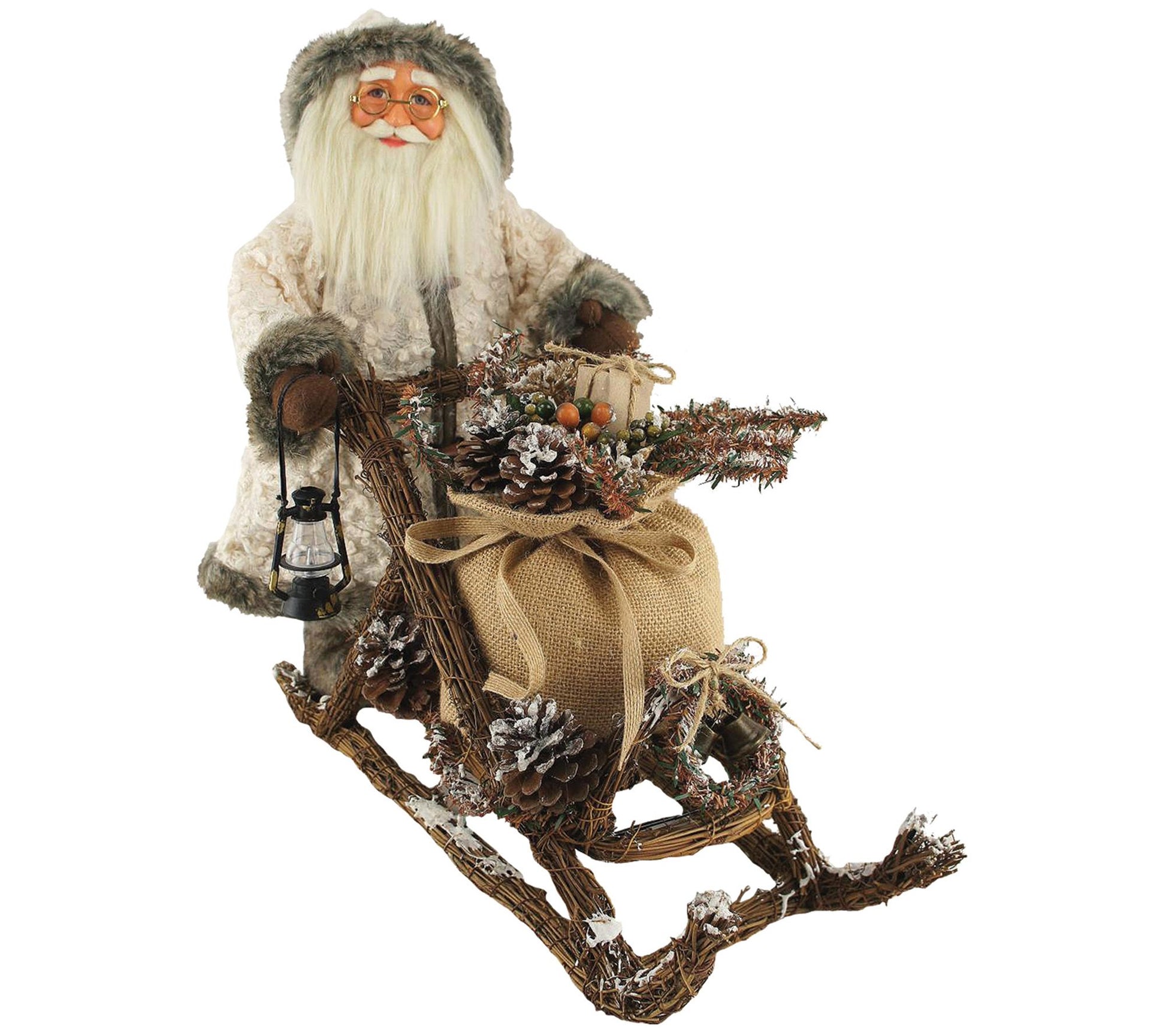 18" Woodsman on Mushing Sled by Santa's Workshop